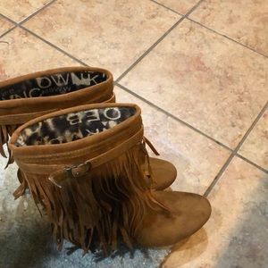 Brand new shingles boots with lots of wear.